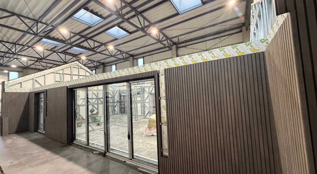 NP5 wall panels with windows and facade finishes in the factory